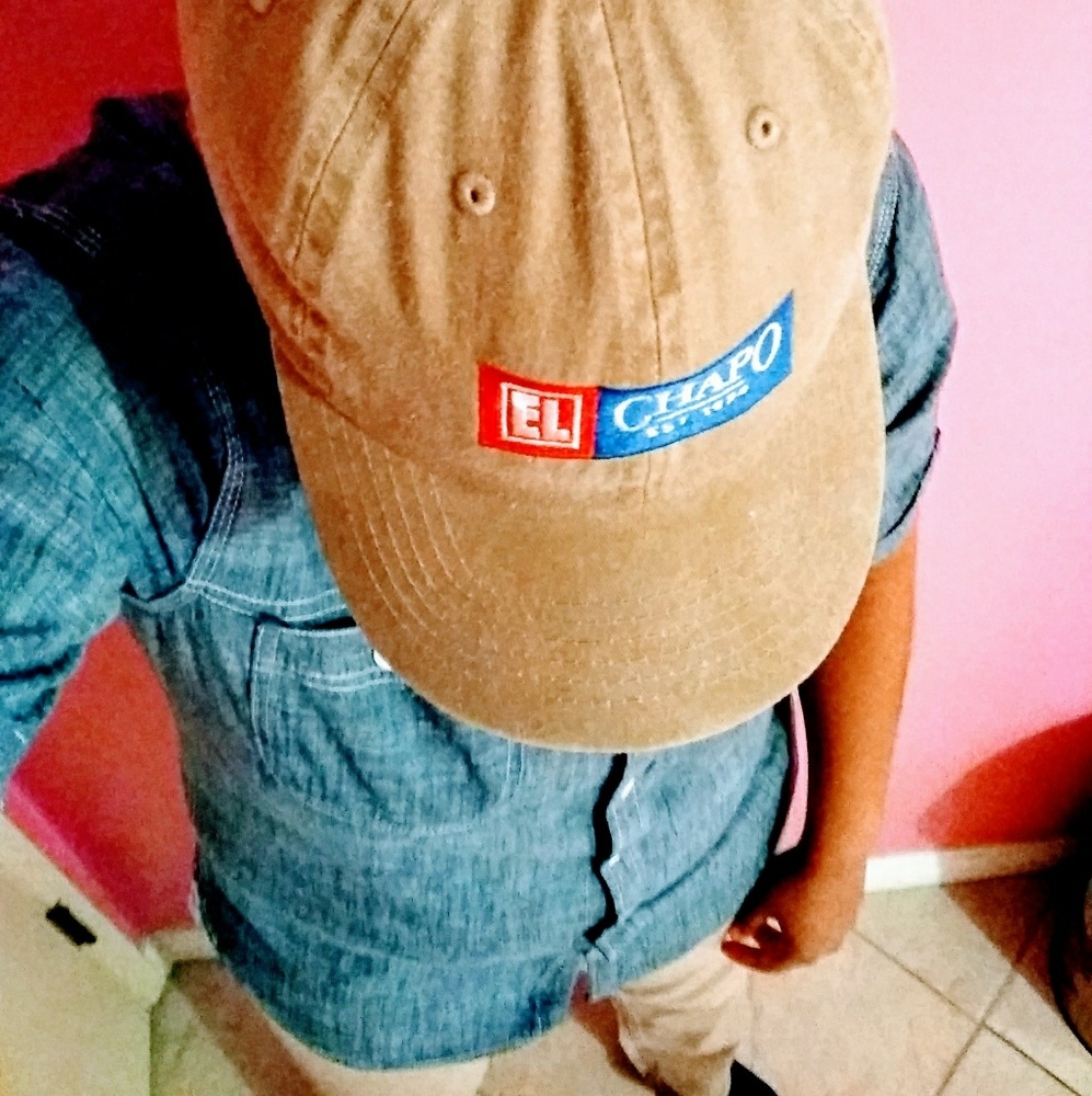 Tan El Chapo dad hat. Denim short sleeve button up